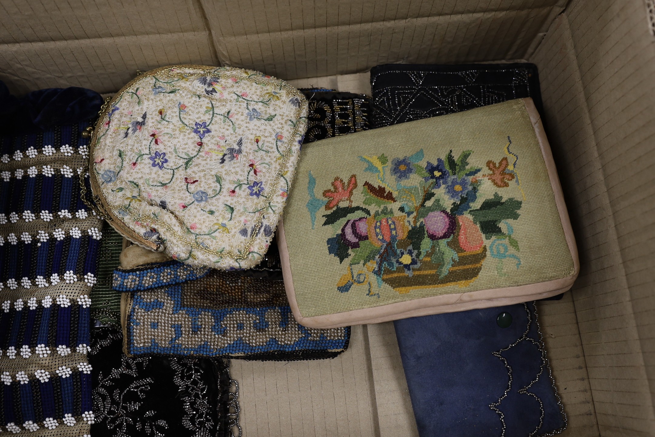 A collection nine 19th and 20th century beaded and petite point bags